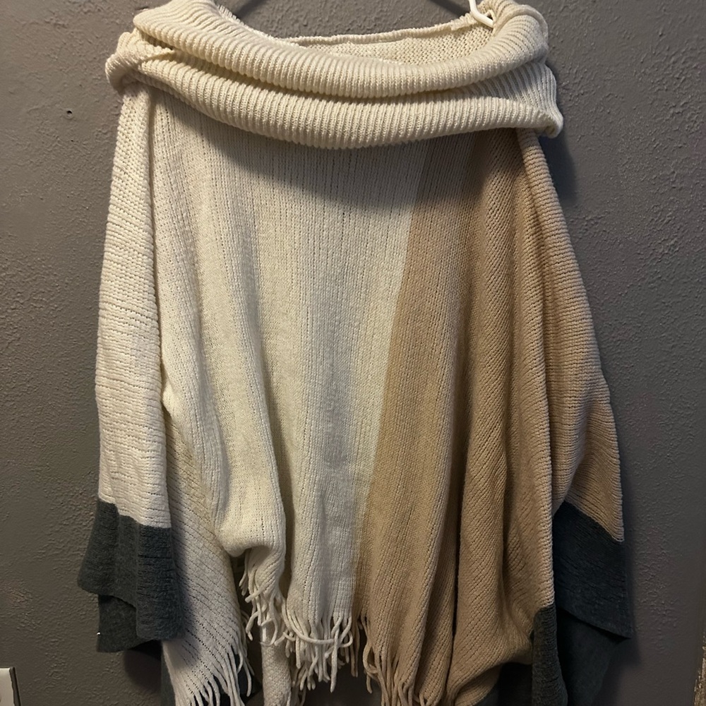 poncho like top, never worn